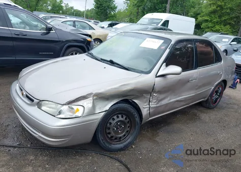 1999 Toyota Corolla Le из США, поврежденный, VIN 2T1BR12E9XC204275